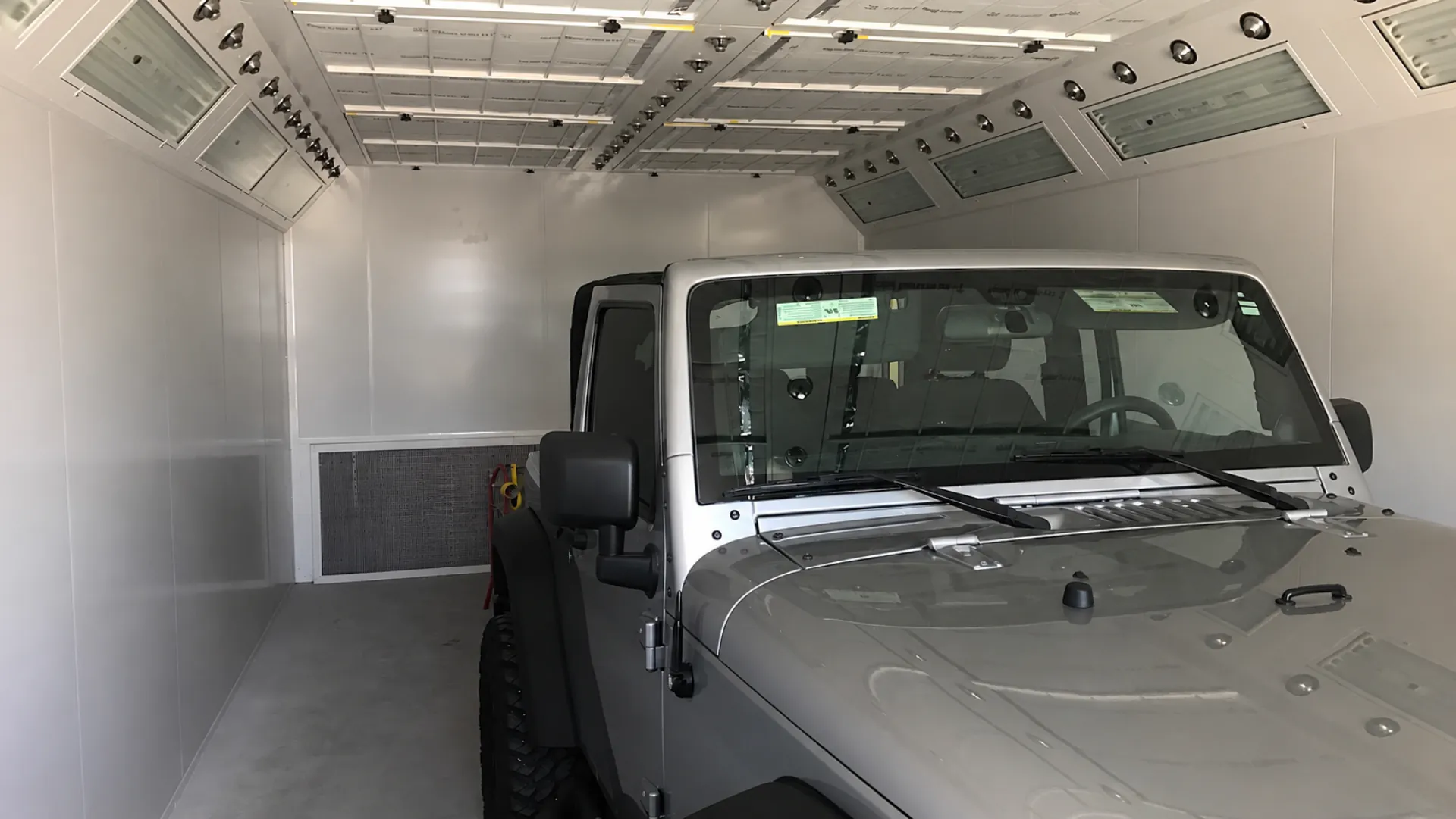 Vehicle sitting in a painting both